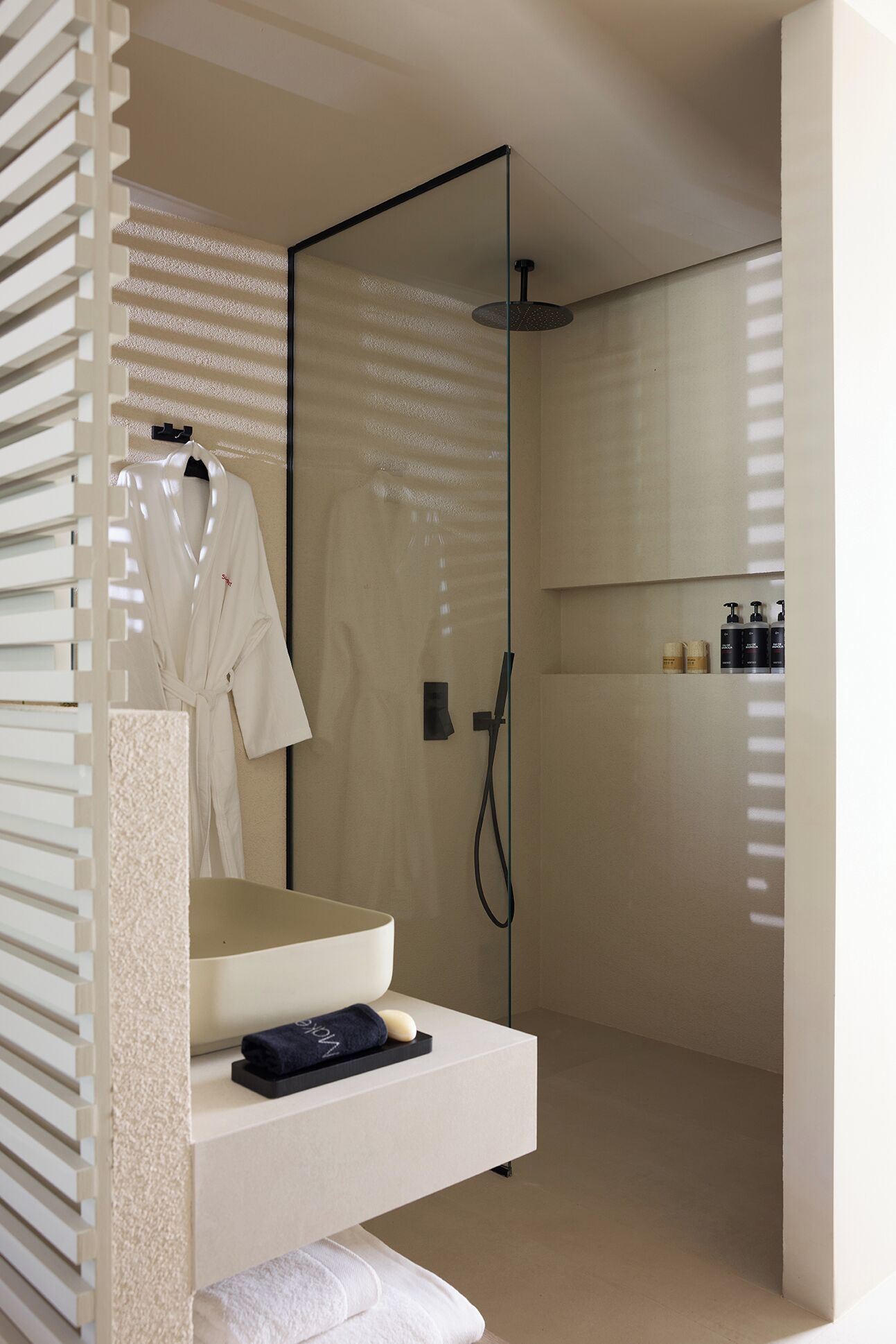 Sundeck Suite with Jetted Tub | Bathroom | Designer toiletries, hair dryer, bathrobes, slippers