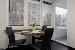 Dining - Cozy Apartment | Balcony and Workspace (Warszawa)
