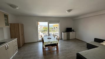 Apartment (One bedroom apartment 3) | Living room | 32-inch Smart TV with satellite channels