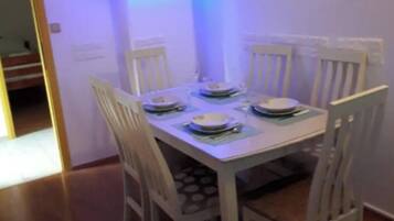 Apartment (TwoBedroom Apartment with Sea View) | Living room | 32-inch flat-screen TV with cable channels