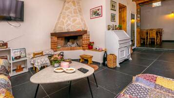 House (Holiday home Kuzmino) | Living room | 32-inch Smart TV with satellite channels