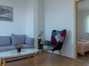 House (Eight Bedroom Holiday Home with Hot-T) | Living room | 32-inch flat-screen TV with satellite channels - Vacation Home Pasalic (Kastela)