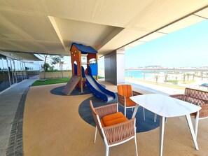 Family Apartment, Balcony, Beach View | Children’s area