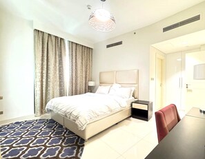 Căn hộ dành cho gia đình, ban công, quang cảnh bãi biển | Màn/rèm cản sáng, bàn ủi/dụng cụ ủi quần áo