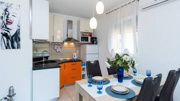 Apartment (Classic One Bedroom Apartment with Ba) | Private kitchen | Fridge