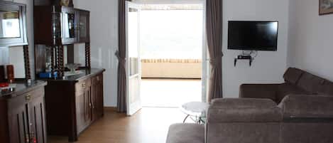 Apartment (Three Bedroom Apartment with Sea View) | Living room | 32-inch flat-screen TV with satellite channels