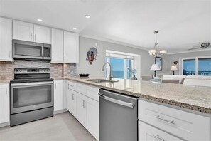Fridge, microwave, oven, stovetop - Peaceful Penthouse Escape 180° Views - Oceanfront (Indian Shores)