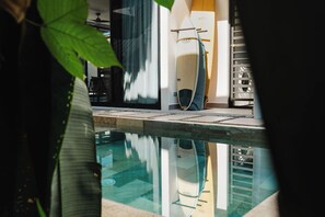Pool - Beautiful and comfortable home located in Hermosa Palms Casa 71, just steps from the beach. This tropical getaway offers spacious living areas, a fully equipped kitchen, and access to exclusive community amenities including pools. (Playa Hermosa)