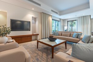 TV - Peaceful Villa Bedroom + Assistant Room, Cliffside View (Fujairah)