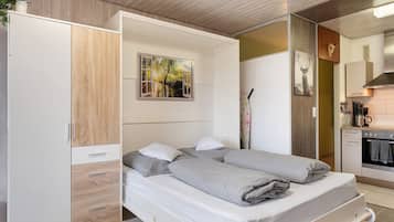 1 habitación, tabla de planchar con plancha, wifi y ropa de cama