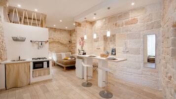 Appartement Supérieur, balcon, vue ville | Cuisine privée