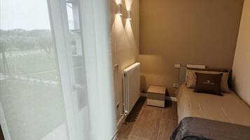 Deluxe Apartment, Hill View | Iron/ironing board, free WiFi
