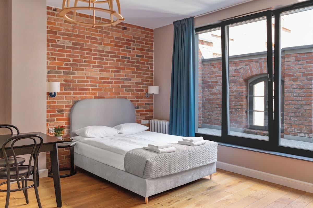 Apartemen Comfort | Setrika/meja setrika, Wi-Fi gratis, dan seprai linen