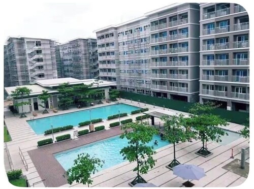 Amazing 2-bedroom budget apartment with AC and prepaid wi-fi in Trees Residences