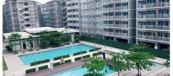 Amazing 2-bedroom budget apartment with AC and prepaid wi-fi in Trees Residences