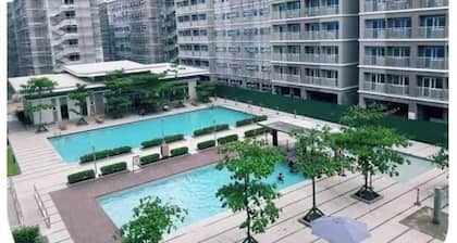 Amazing 2-bedroom budget apartment with AC and prepaid wi-fi in Trees Residences