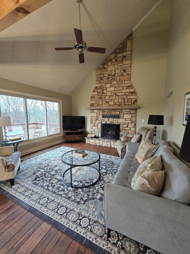 Charming 3-bedroom farmhouse with large front and back decks. Fenced in backyard