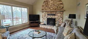 Charming 3-bedroom farmhouse with large front and back decks. Fenced in backyard