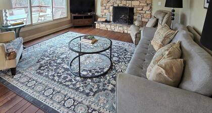 Charming 3-bedroom farmhouse with large front and back decks. Fenced in backyard