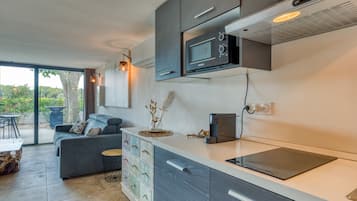 Fridge, microwave, stovetop, coffee/tea maker