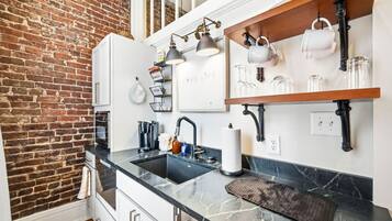 Fridge, microwave, dishwasher, coffee/tea maker