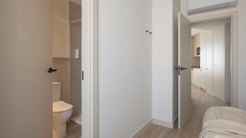 Apartment, 2 Bedrooms | Laptop workspace, free cribs/infant beds, free WiFi, bed sheets