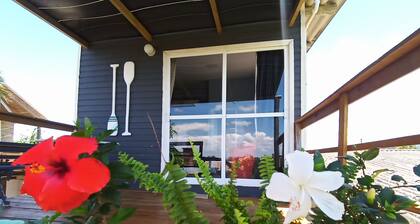 Suite with kitchen, overlooking the lagoon. In Passo de Torres