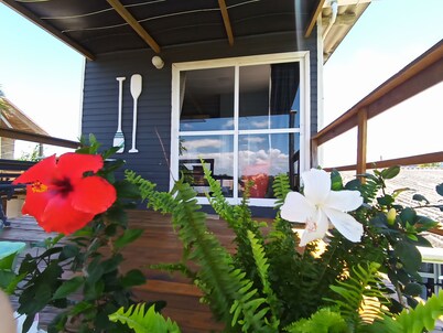 Suite with kitchen, overlooking the lagoon. In Passo de Torres