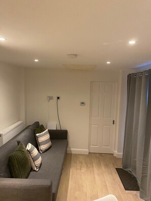 Living area - Clean & Modern One-Bedroom with Private Entrance (London)