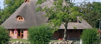 Vacation apartment directly at the fishing pond with parking lot and terrace