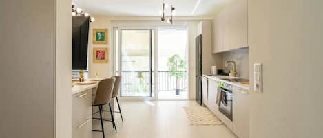 Departamento, 1 habitación, para fumadores, balcón | Cocina privada