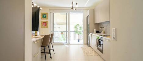 Departamento, 1 habitación, para fumadores, balcón | Cocina privada