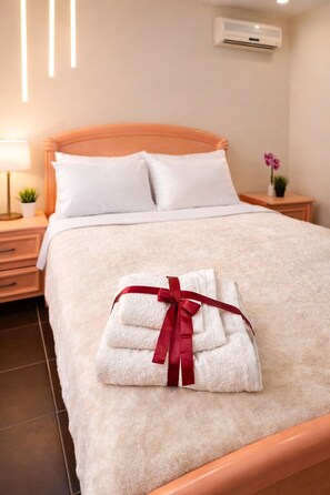 2 habitaciones, tabla de planchar con plancha, wifi y ropa de cama 