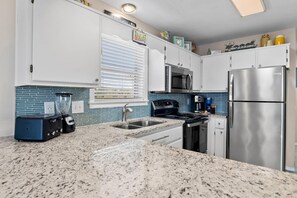 Huoneisto, useita sänkyjä (St. Martin Beachwalk Villas 321) | Yksityinen keittiö