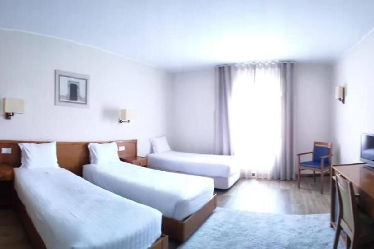 Chambre Triple Standard | Chambres insonorisées, fer et planche à repasser, Wi-Fi gratuit