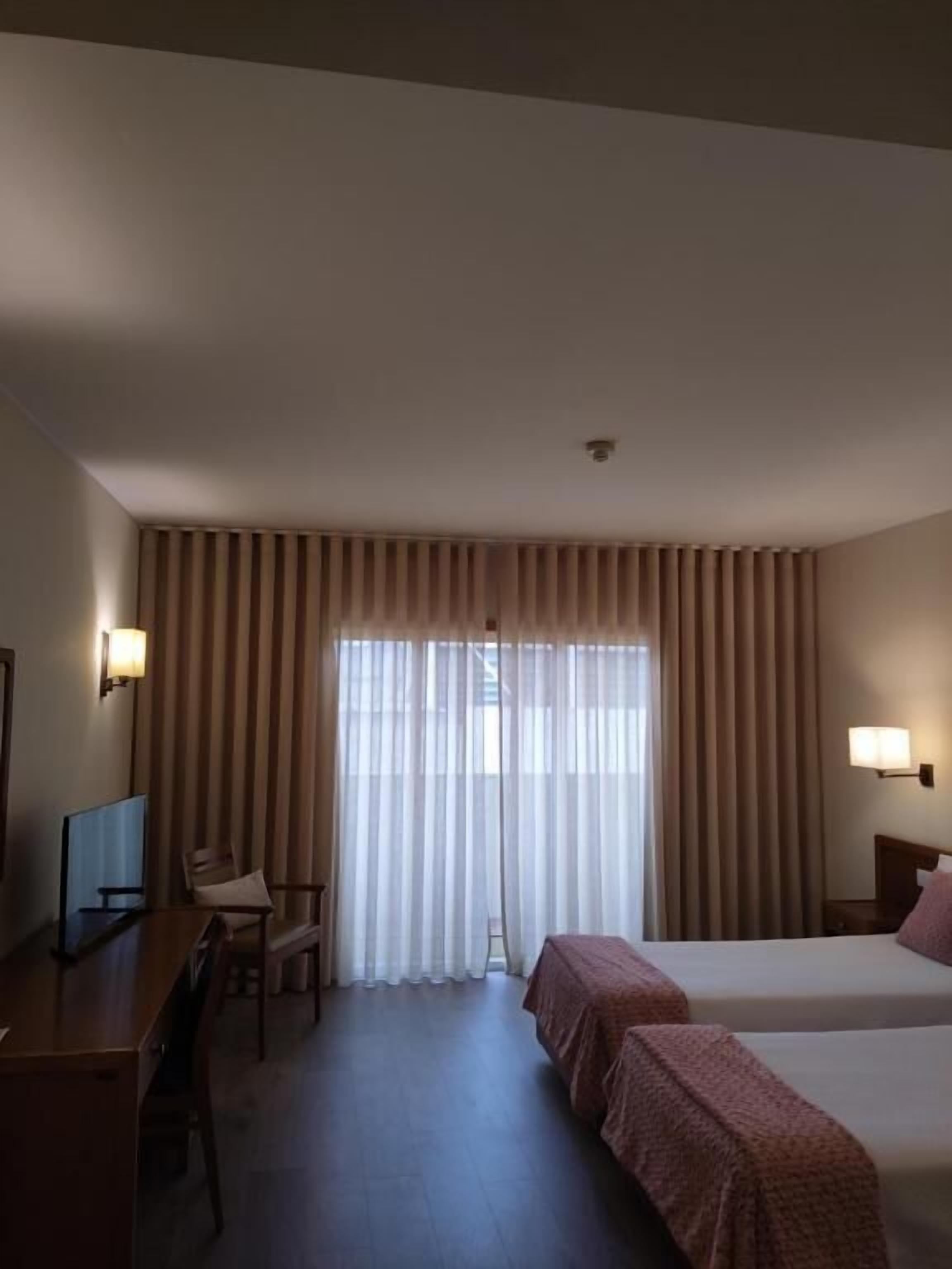 Chambre Standard avec lits jumeaux, véranda | Chambres insonorisées, fer et planche à repasser, Wi-Fi gratuit