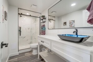 Shower, towels, soap, toilet paper