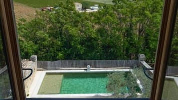 Deluxe Suite, Patio, Mountain View | Pool | Seasonal outdoor pool, pool umbrellas, sun loungers