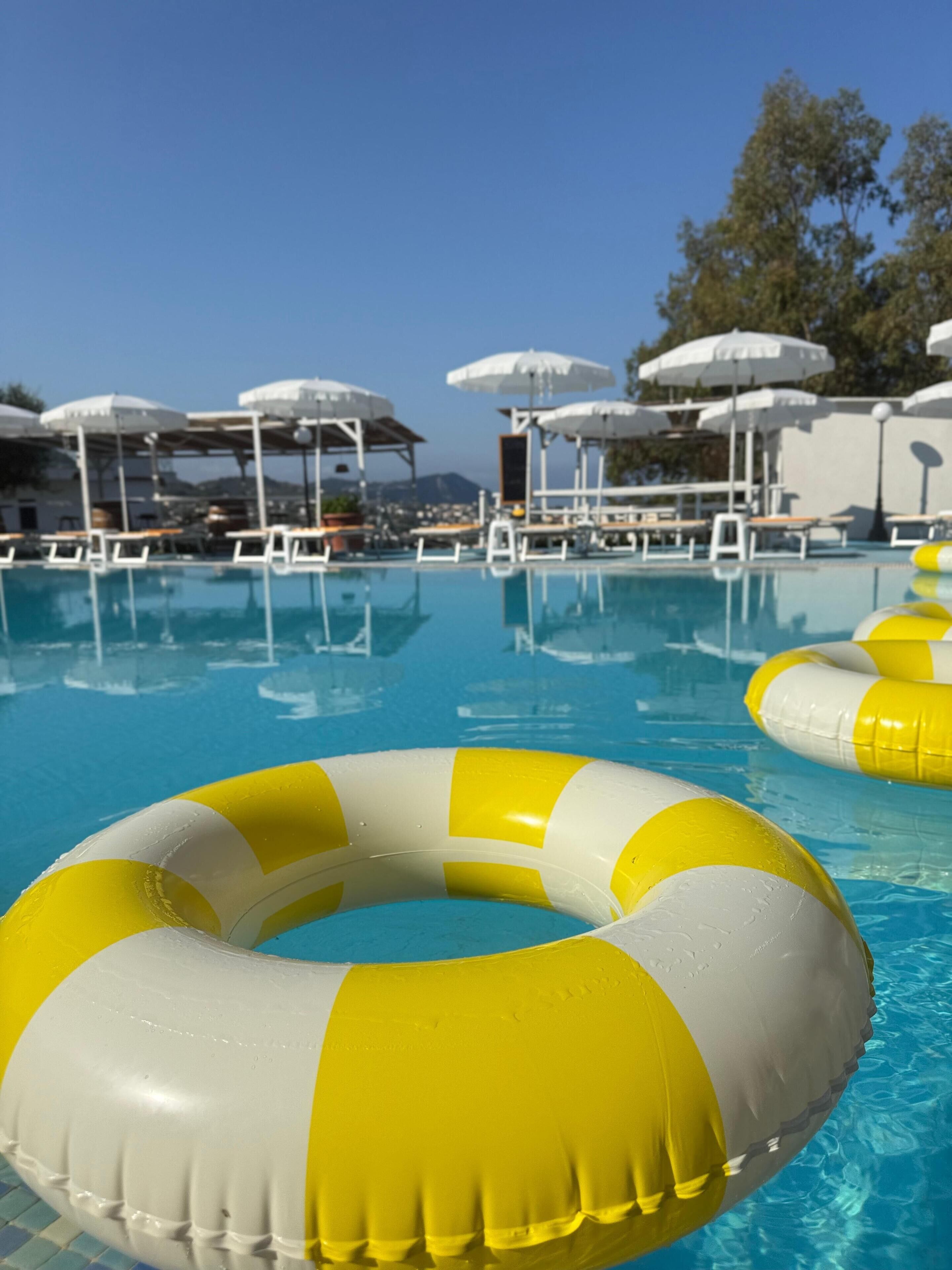 Indoor pool, outdoor pool, pool umbrellas, sun loungers