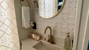 Shower, towels, soap, shampoo