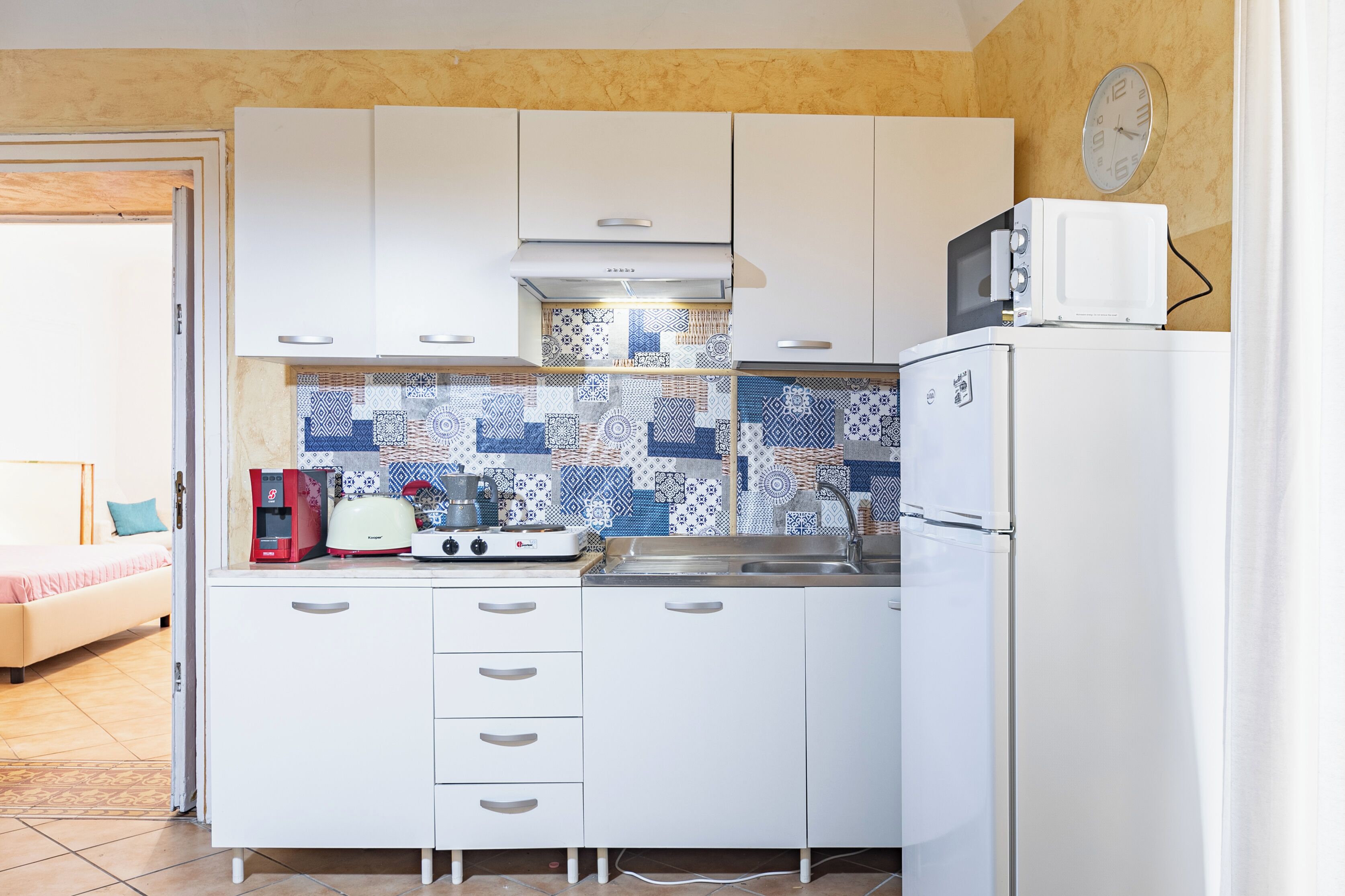 Apartamento | Cozinha privada | Geladeira grande, micro-ondas, cooktop
