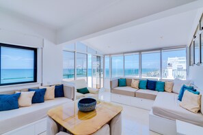 Apartment, 3 Bedrooms, Pool Access | Living room - Carteia Beachfront at Praia da Gaivota (Loulé)