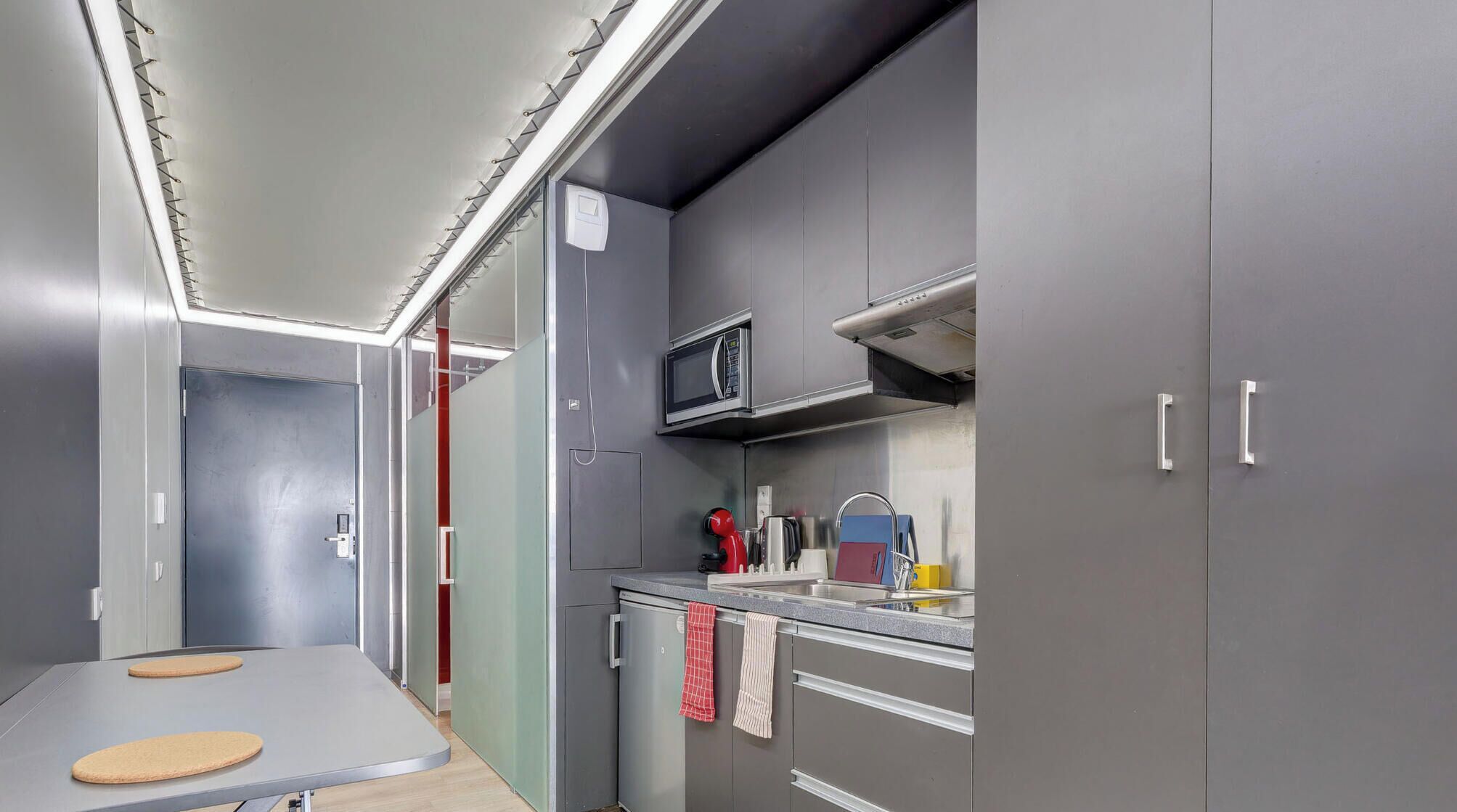 Fridge, microwave, stovetop, coffee/tea maker