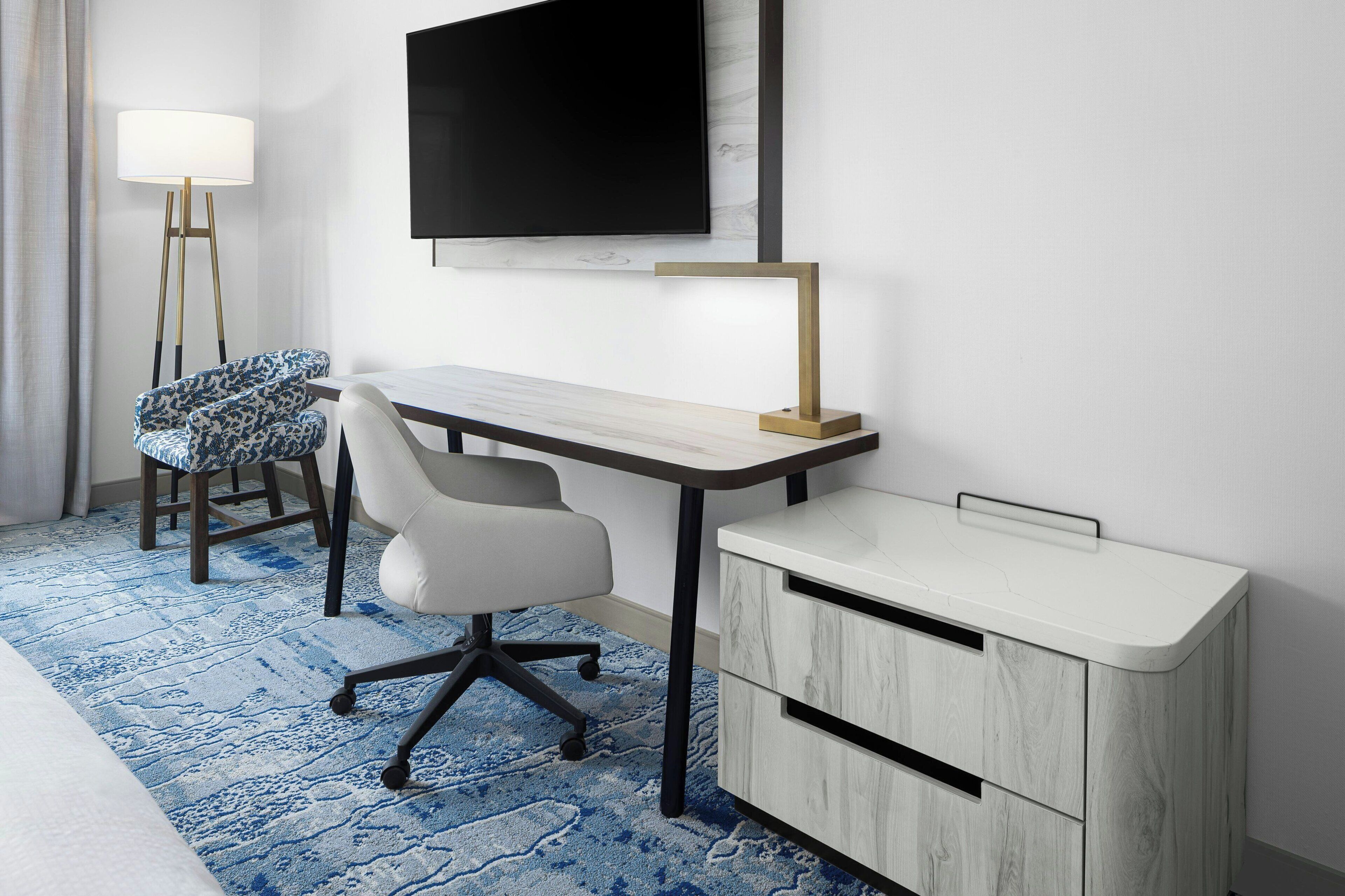 Desk, laptop workspace, blackout curtains, iron/ironing board