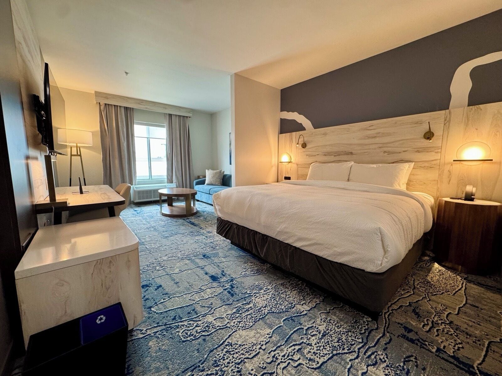 Desk, laptop workspace, blackout drapes, iron/ironing board