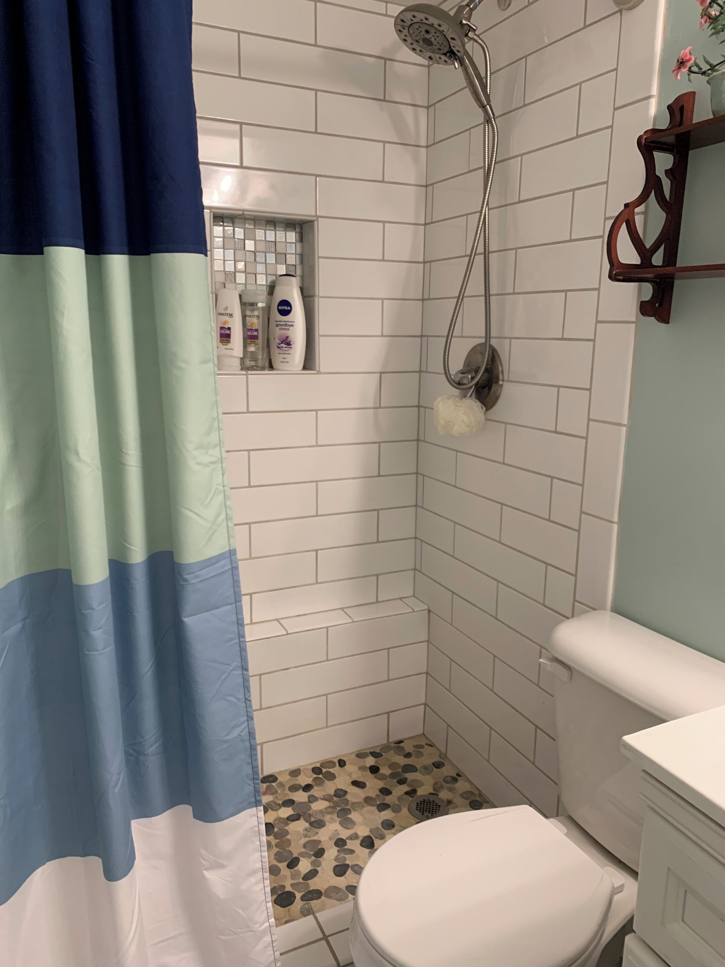 Shower, hair dryer, towels, toilet paper