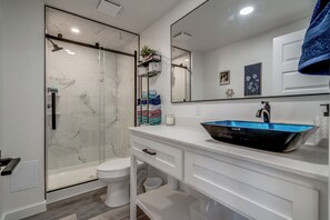 Shower, towels, toilet paper