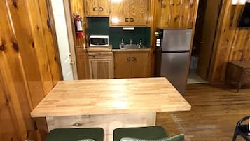 Fridge, microwave, stovetop, cookware/dishes/utensils