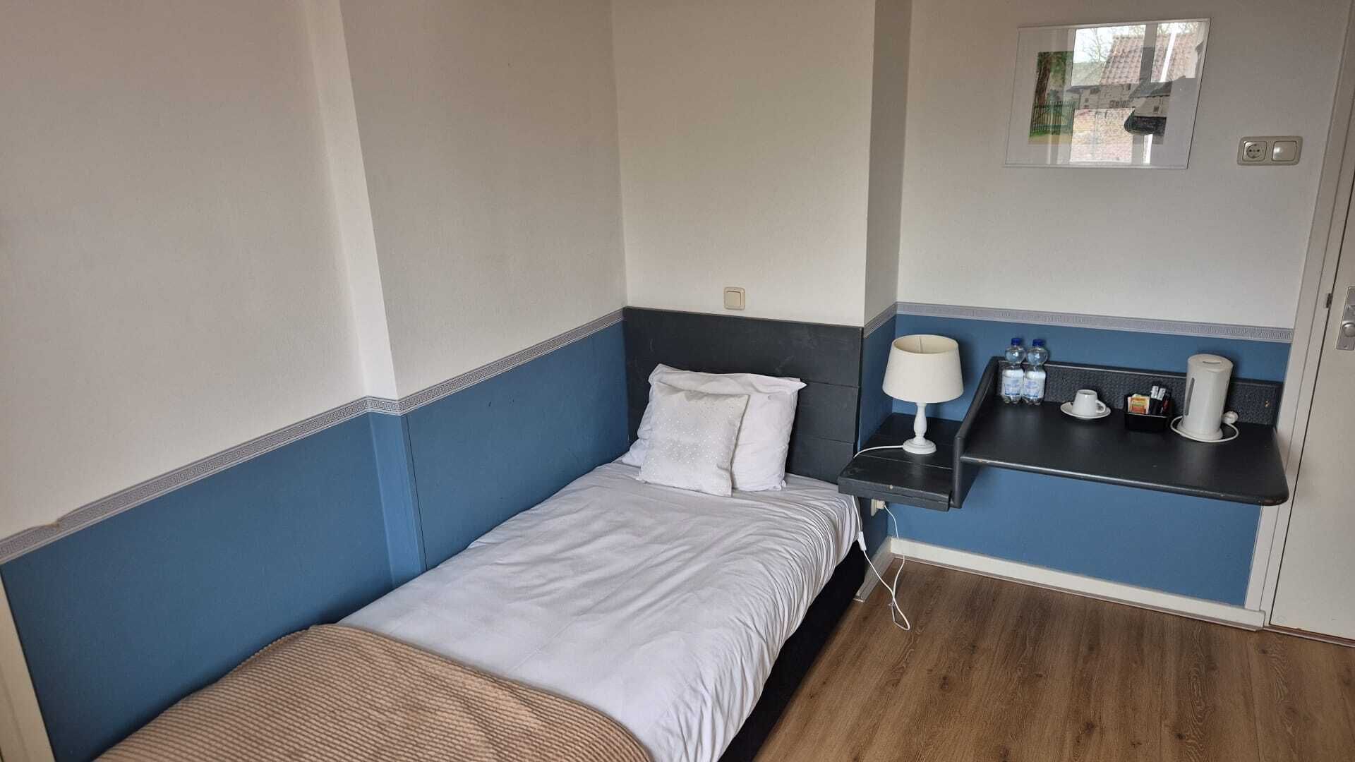 Singola Classic, 1 letto singolo, non fumatori, bagno privato | Ferro/asse da stiro