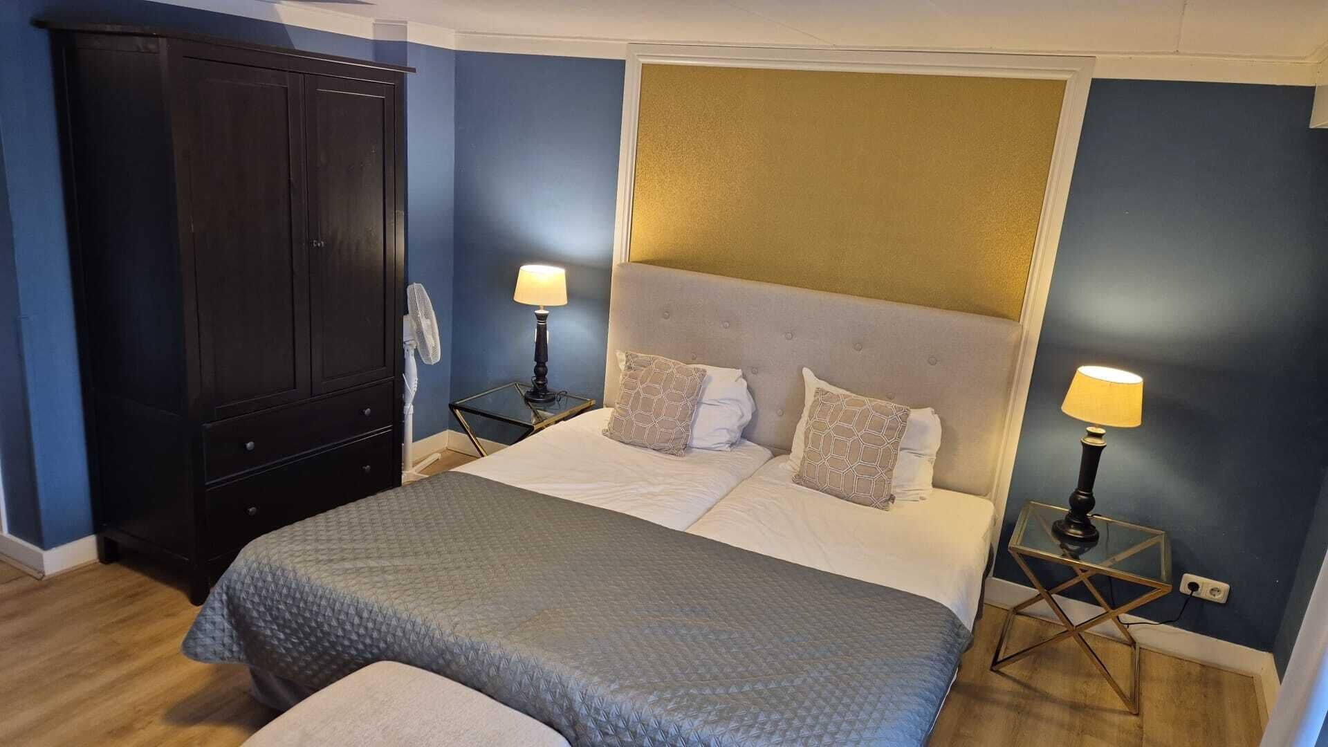 Doppia Deluxe, 1 letto king, non fumatori, bagno privato | Ferro/asse da stiro